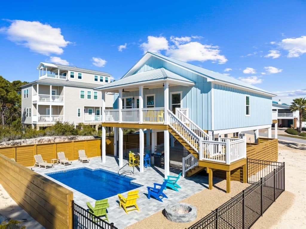 coastal home with an in ground pool designed and decorated by Shore House Furniture in Panama City Beach Florida